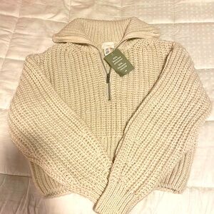 Cream H&M knit sweater, US size small. Never been worn.